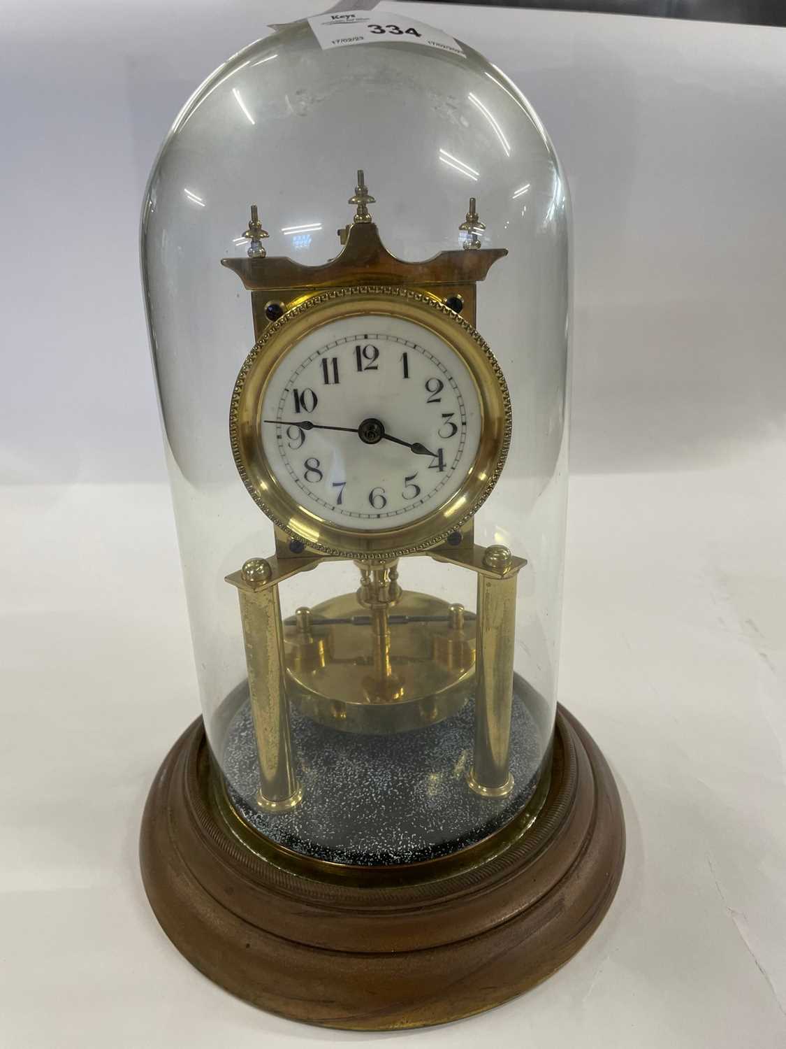 Anniversary clock under a glass dome
