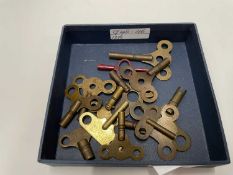 Small box containing a quantity of clock keys