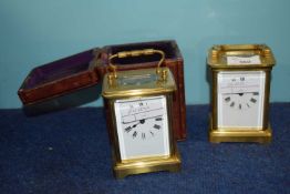 Two further brass carriage clocks, one with case