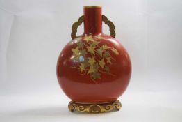 Large Royal Worcester moon flask, early 20th Century, the orange ground with gilt floral