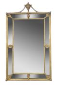 A decorative 19th century gilt framed wall mirror with urn and swag mount 88 x 51cm