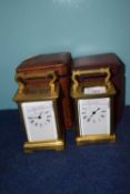 Two brass carriage clocks in cases