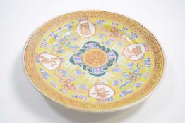 Small Chinese porcelain plate, the yellow ground with polychrome decoration of Good Luck symbols,