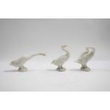 Group of three Lladro geese in various poses