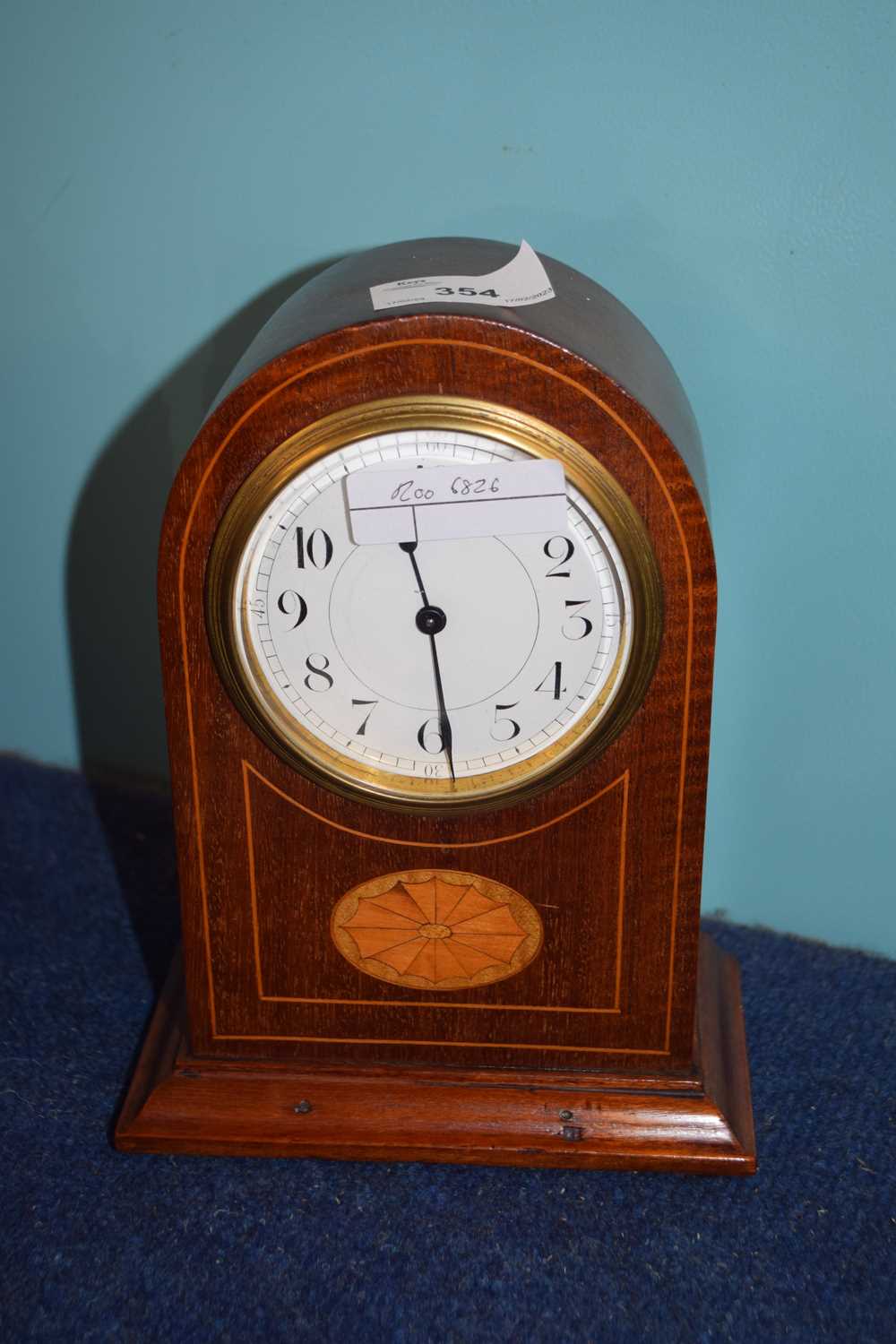 Edwardian mantel clock with inlay decoration, the Swiss made movement marked Buren