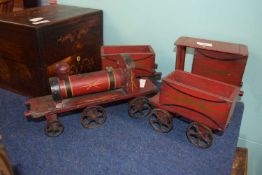 Early 20th Century painted wooden train set with engine and tender and two trucks