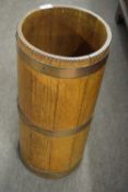 Late 19th or early 20th Century oak and copper bound stick stand of circular form, 62cm high