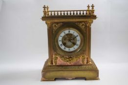 Late 19th early 20th Century brass mantel clock, 30cm high