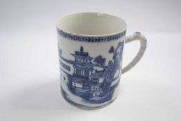 18th Century Chinese export tankard with blue and white designs (rim chip and hairline), 13cm high
