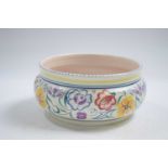 Poole pottery bowl with typical floral designs, 17cm diameter