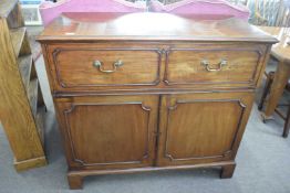 Georgian mahogany secretaire cabinet with fitted interior over two panelled doors raised on