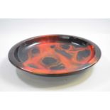 Royal Doulton flambe dish signed by Noke with a mottled sung glaze, 32cm diameter