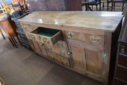 18th Century oak dresser base with six drawers and two panelled doors, 164cm wide