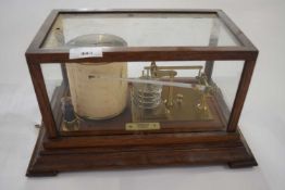 20th Century barograph set in a hardwood glazed case bearing makers label Turnbull & Co, 60