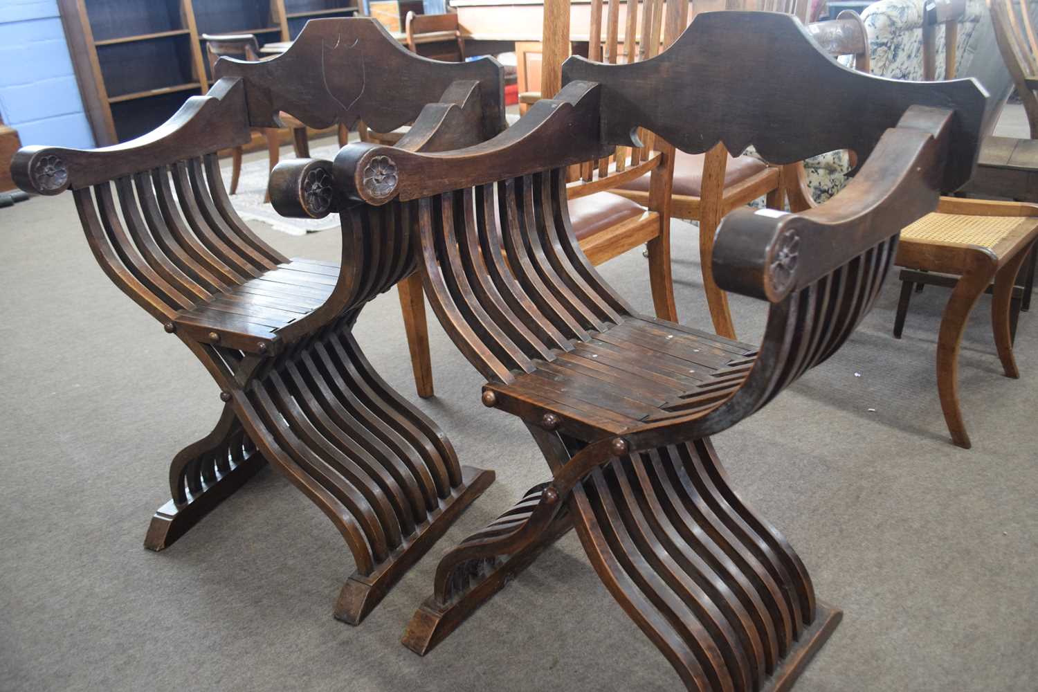 Pair of 20th Century Savonarola chairs with flower carved decoration to the arms, 95cm high - Image 3 of 3