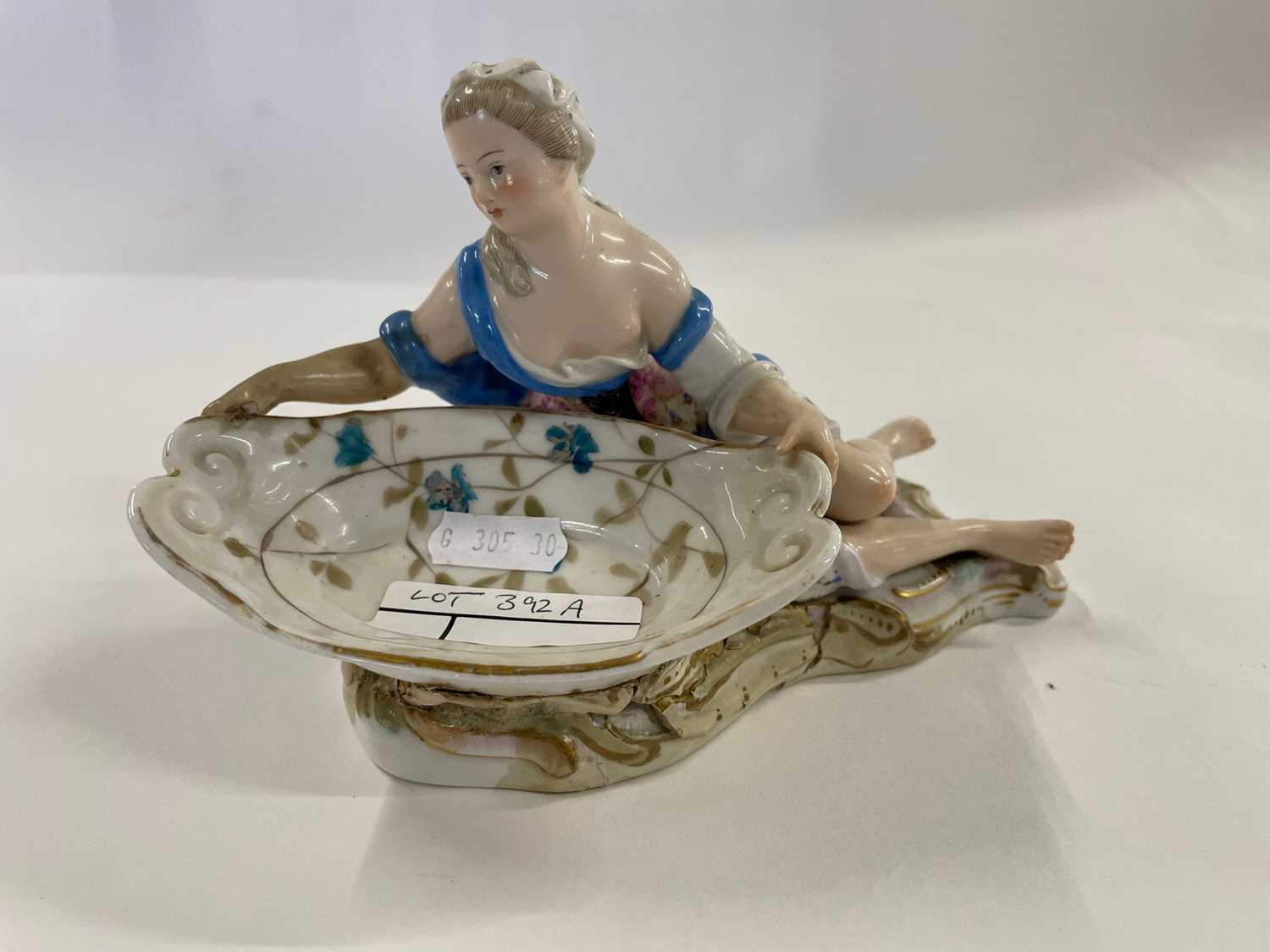 19th Century Meissen sweetmeat figure modelled as a young girl holding a tray (a/f)