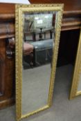 20th Century bevelled rectangular wall mirror in gilt finish frame, 39 x 101 cm