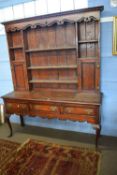 18th Century style cherry and mahogany cross banded dresser, the top with shaped cornice over a