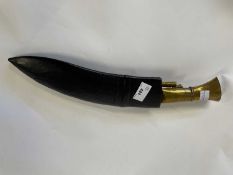 Kukri knife with brass handle in leather scabbard the scabbard with two smaller examples