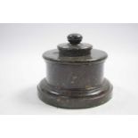 Marble inkwell and cover raised on circular base