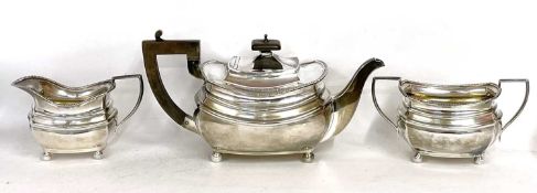 George VI silver three piece tea set comprising teapot, twin handled sugar bowl and jug of rounded