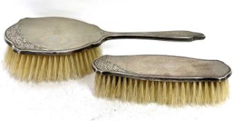 Hallmarked silver backed dressing table hairbrush and matching clothes brush, engine turn