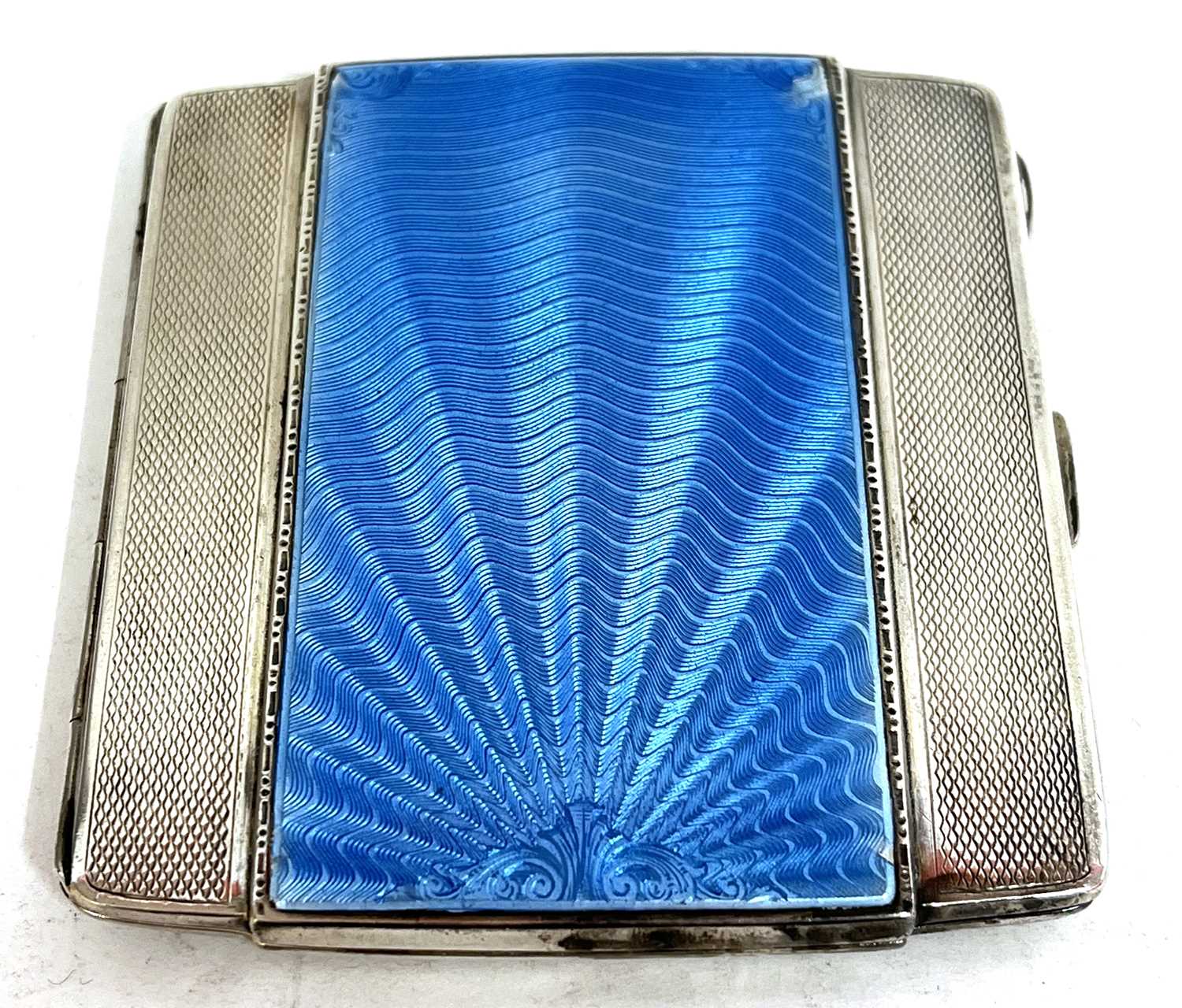 An Art Deco silver and enamel cigarette case, the front with applied with a shell blue guilloche - Image 3 of 5