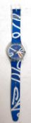 A Swatch quartz wrist watch Athens 2004 model, the watch has a blue and white strap along with a