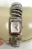 A Links of London ladies quartz wrist watch with original box and manual, the watch has a