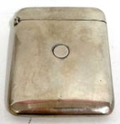 An Edward VII silver card case of plain polished form with spring opening mechanism, London 1903,