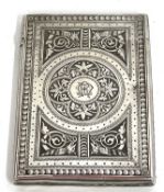 A Victorian card cased, well engraved with a geometric design around engraved initials, inside lip