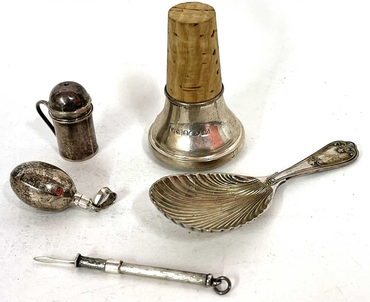 Mixed lot to include a silver cased toothpick, a white metal and cork bottle stopper, plated shell - Image 2 of 2