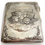 A late Victorian card case, the front embossed with five angels heads, fitted interior, Birmingham