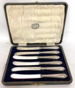 A cased set of six silver handled butter knives, hallmarked for Sheffield 1918/19, makers mark