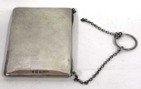 A George V card case of plain rectangular form with chain handle (part detached), leather