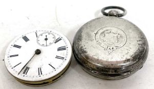 A silver Hunter pocket watch along with a pocket watch movement and dial, the silver pocket watch is