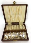 A cased set of six silver Old English and shell pattern teaspoons, Sheffield 1956, makers mark for