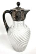 A Victorian silver mounted claret jug with clear glass ovoid shaped spiral cut body, Birmingham