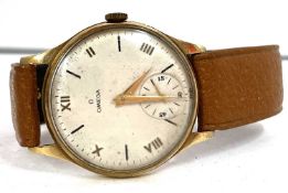 A 9ct gold vintage Omega wristwatch, hallmarks can be found on the inside of the Dennison case