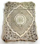 A late Victorian card case engraved with a basket of flowers and monogrammed, 70.3 gms (apparently