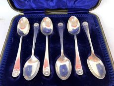 A cased set of six George V silver teaspoons, Old English and shell pattern, Sheffield 1929,