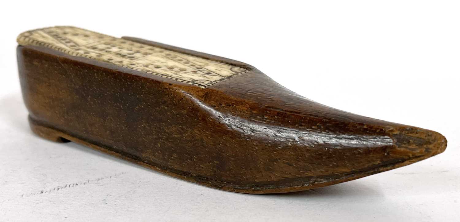 A vintage treen shoe snuff box with bone slide cover, 12cm long