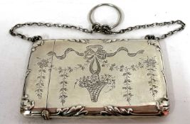 A Edward VII silver card case engraved with a ribbon tie and basket of flowers, chain and ringlet
