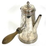 A small silver coffee pot in George III style with an urn hinged lid and treen turned handle, reeded