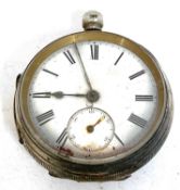 A silver pocket watch with a white enamel dial with black Roman numeral hour markers, silver