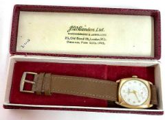 A 9ct gold J W Benson wrist watch with original box, the hallmark for 9ct gold can be found inside