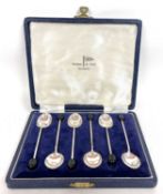 A cased set of six George VI silver bean end coffee spoons, Sheffield 1946, makers mark for Walker &