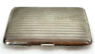 A George V silver card case with engine turned line decoration, Birmingham 1910, makers mark for