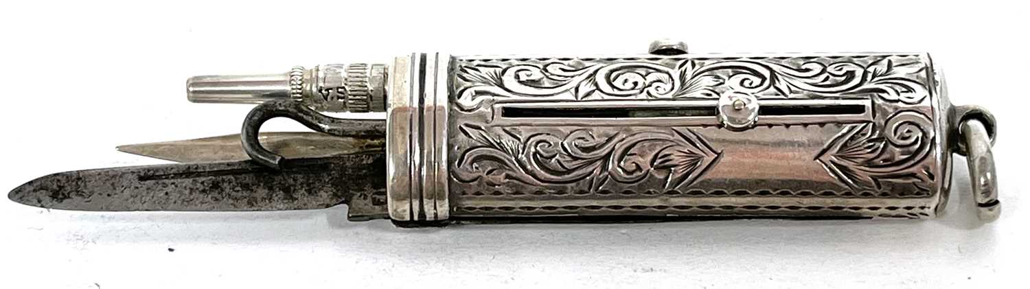 A small Victorian combined silver sliding pencil, button hook and penknife with engraved body and