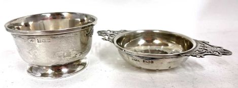Hallmarked silver tea strainer and bowl, the twin handle strainer with geometric pierced bowl